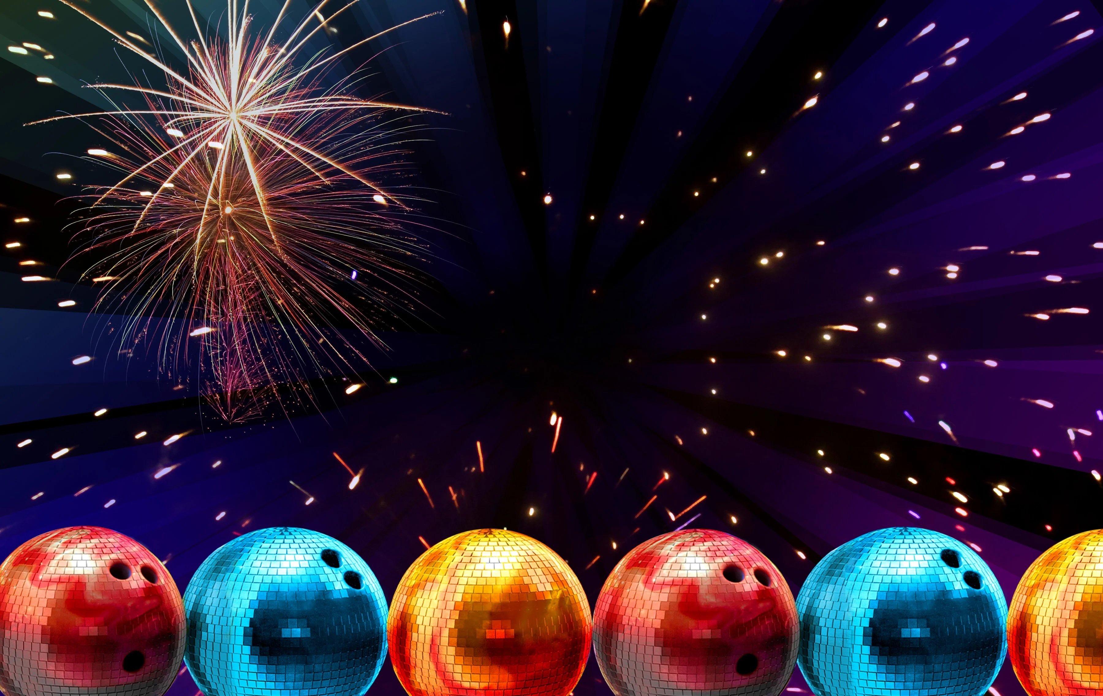 Bowling balls in front of fireworks