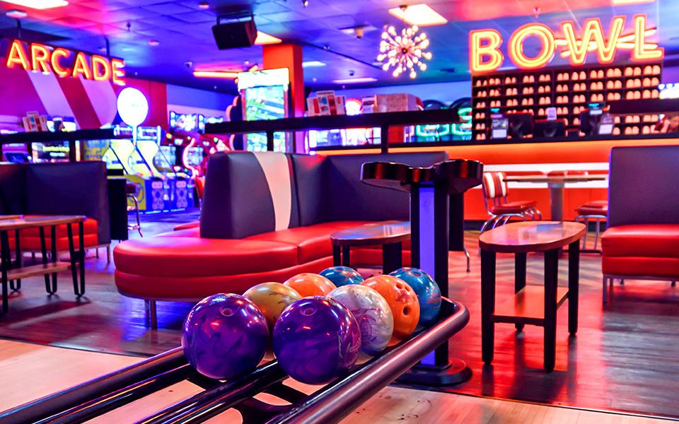 Bowling ball return with bowling counter in the background