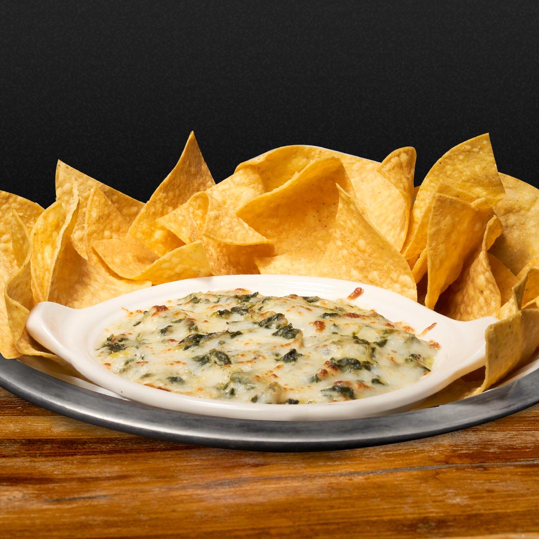 Classic spinach and artichoke dip topped with melted mozzarella.