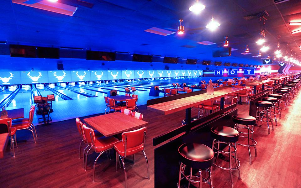 Black light bowling lanes and tables